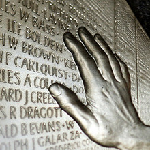 1994-Vietnam-Veterans-Memorial-commemorative-U.S.-silver-dollar-proof-detail-Photo-by-kevindooley-on-flickr.jpg