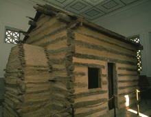 Abe-Lincoln-Log-Cabin-Birthplace-by-eoghanacht-on-Wikimedia-2.jpg