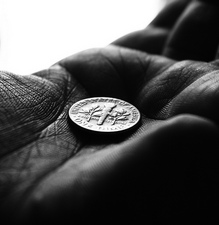 Free-Hand-Holding-A-Dime.jpg