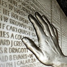 1994-Vietnam-Veterans-Memorial-commemorative-U.S.-silver-dollar-proof-detail-Photo-by-kevindooley-on-flickr.jpg