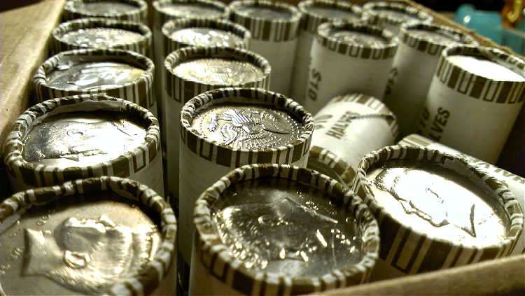 50-cent pieces in coin rolls from the bank. photo by zcopley on Flickr These are 50-cent pieces in coin rolls from the bank.