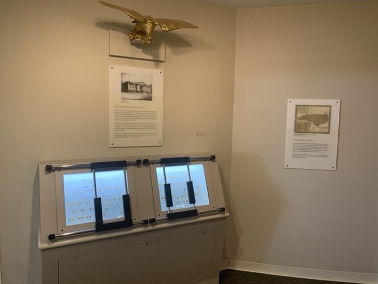 This is an educational display with the Charlotte Mint gold coin collection at the Mint Museum. 