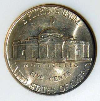 This is a U.S. war nickel. Notice the large "D" over the dome of Monticello? The war nickels that have silver in them will have a large mintmark (either P or D or S) on the reverse side of the coin. 