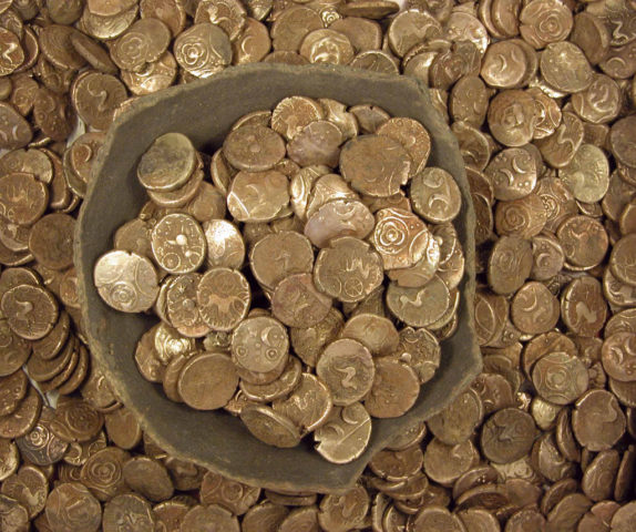 Coin collecting vs. coin hoarding: here's a hoard of ancient coins. There sure are a bunch of coins here, aren't there? 