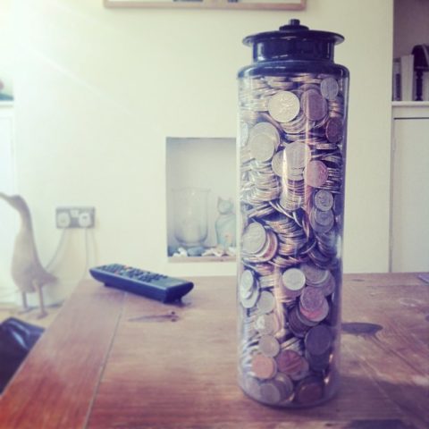 Collecting coins in a change jar