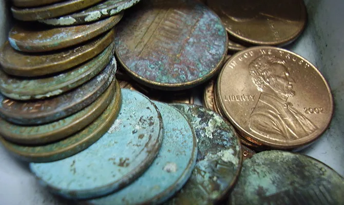 See how to clean corroded coins.