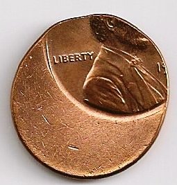 An off center error coin - off strike coin