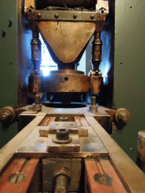 This is an old coin press in the New Orleans Mint museum. 