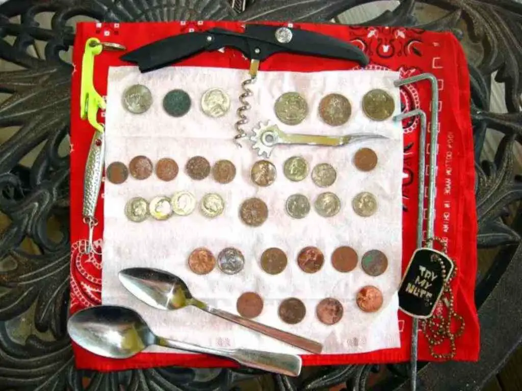 These are some of the old coins and other metal treasures found with a metal detector. 