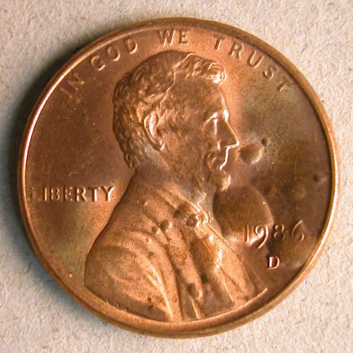See examples of error coins with bubbles in them.