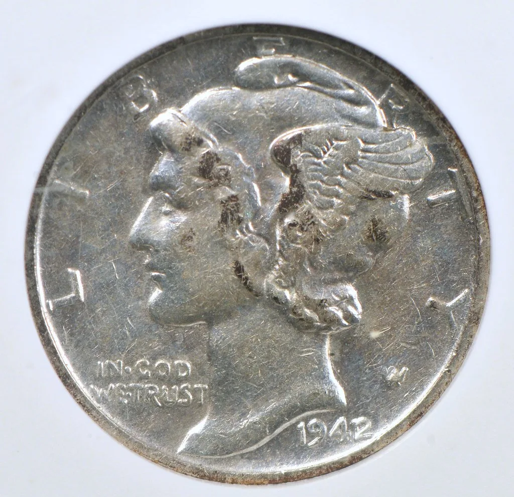 This is a rare 1942/1 Mercury dime. 
