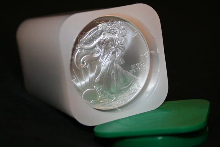 A roll of American Silver Eagle bullion coins.