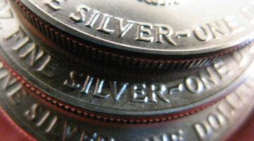U.S. silver one dollar coins.