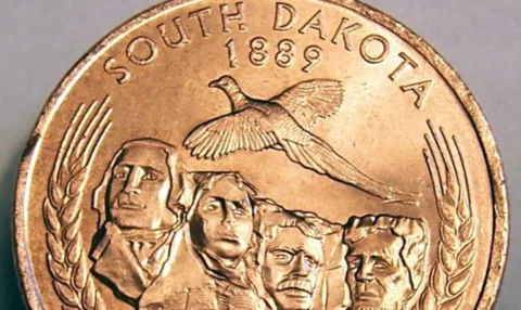 This is one of the 50 state quarters -- the South Dakota quarter. This error quarter is missing the extra layer of silver!