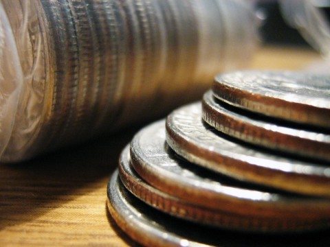 A stack of U.S. quarters symbolizes the U.S. Mint's release of the new America the Beautiful Quarters. 