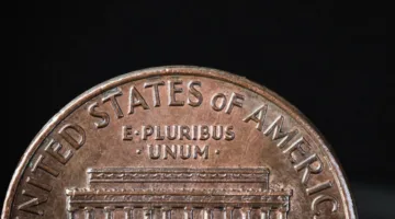 1992 Close AM pennies have the bottoms of the letters "A" and "M" in "AMERICA" nearly touching. However, the Close AM dies were not supposed to be used until the following year, for 1993 pennies! Therefore, these are now valuable transitional error coins!