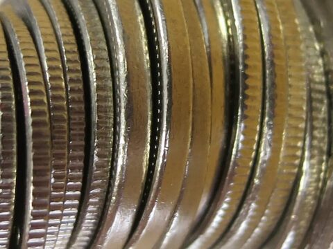 You have to look close up with a magnifying glass to see coin rim errors.