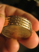 us-dollar-coins-in-god-we-trust-on-coin-edge-by-cometstarmoon.jpg